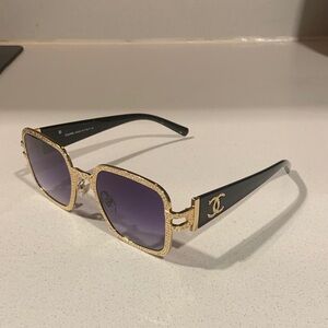 CHANEL Elegant Gold and Black Sunglasses